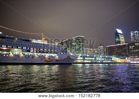 HONG KONG  - 26 JANUARY, 2016: view of Kowloon from a Star Ferry at night. Kowloon is an urban area in Hong Kong comprising the Kowloon Peninsula and New Kowloon.