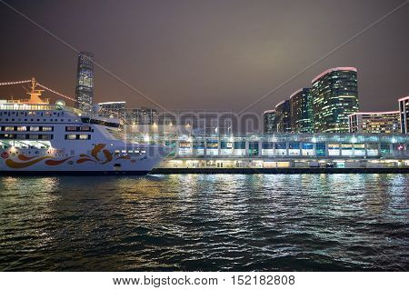 HONG KONG  - 26 JANUARY, 2016: view of Kowloon from a Star Ferry at night. Kowloon is an urban area in Hong Kong comprising the Kowloon Peninsula and New Kowloon.