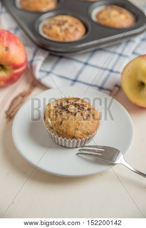 home made bircher mueseli apple muffins on a table