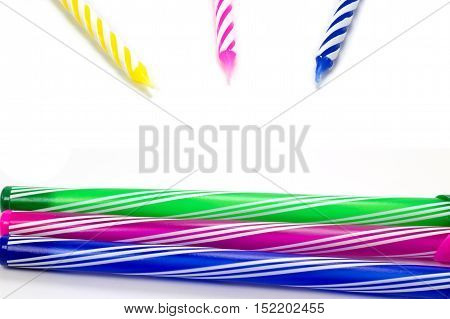 Happy birthday candle and Colorful pen on whithe background