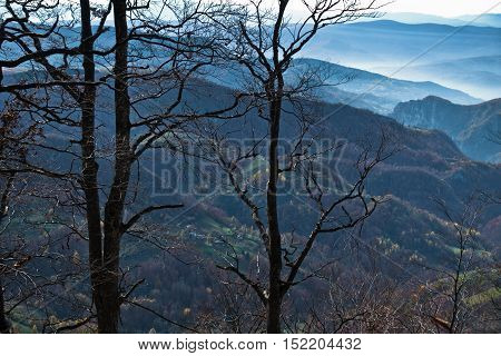 Aerial view of rolling hills and mountains at autumn sunny day, view from Bobija mountain, Serbia