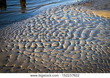 Patterns of sand at the low tide in marine coast of the Baltic Sea