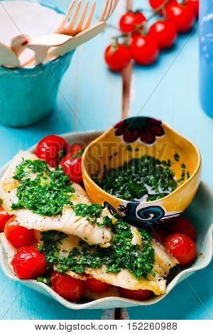 Lazy Fish.fried tilapia fillet with tomato.seletive focus