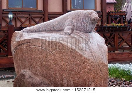 RUSSIA ZELENOGRADSK - OCTOBER 11 2014: Sculpture of the seal Rurik on the Zelenogradsk promenade. In honor of the seal repeatedly appear on the city's beaches. Zelenogradsk (Cranz) is a resort town in Russia on the Baltic Sea.