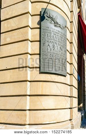 Cologne, Germany - April 9, 2008: A Bronze Plaque In Honor Of The Inventor Of The Cologne Water  Far