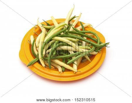 Harvest of asparagus siliculose yellow and green beans. Isolated on white  