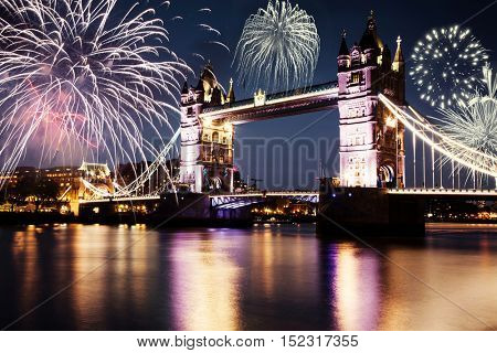 new zear in the city - Tower bridge with firework, celebration of the New Year in London, UK