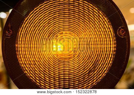 Circular Warning Light Construction Site Yellow Stop Illuminated Glowing Night Dark Traffic Attention Detail Closeup Abstract Pattern