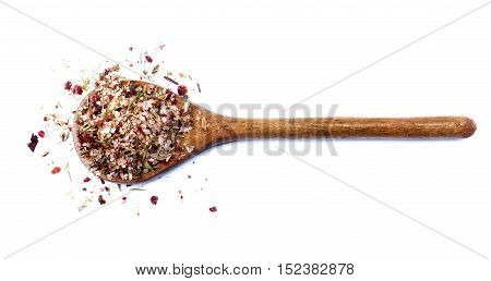 Homemade Herb and Spices Salt with Dried Chili Pepper Rosemary Thyme and Coriander in Wooden Spoon isolated on White background
