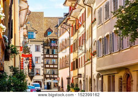 Zug, Switzerland - June 28, 2016: Beautiful colorful buildings in Zug village near Zurich city in Switzerland.