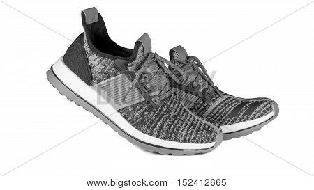 Shoes and sport concept - Sport running shoes gray black and white tone color isolated on white background
