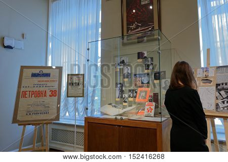 ST. PETERSBURG, RUSSIA - OCTOBER 7, 2016: People in the exhibition dedicated to 85th anniversary of Russian author Julian Semyonov in the Presidential library. People call him The Consummate Insider