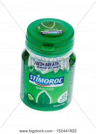 Stockholm, Sweden - August 1, 2015: One green unopend plastic can with sugar free Stimorol spearmint chewing gums isolated on white background.