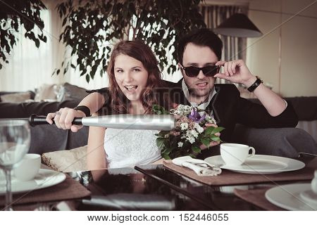 New married couple in a cafe
