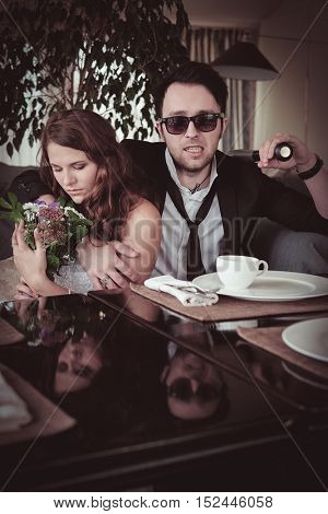 New married couple in a cafe