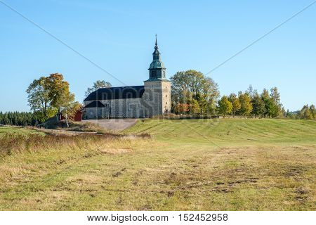 Bjurum church during autumn in the countryside of Vastergotland, Sweden