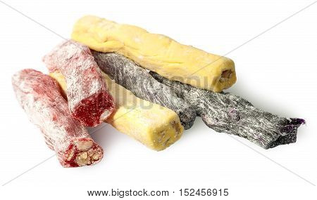 Several pieces of Turkish Delight in a row isolated on white background