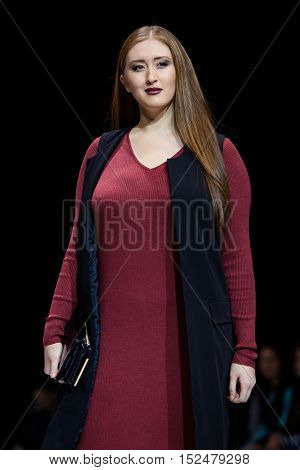 MOSCOW RUSSIA - OCTOBER 19 2016: Plus size model walk runway for LA REDOUTE & PLUS-SIZE MOSCOW catwalk at Spring-summer 2017 Moscow Fashion Week.