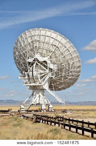 Giant radio telescope dish part of an array in the New Mexico desert