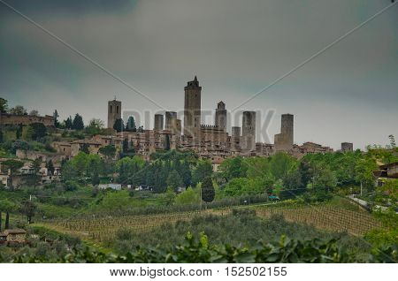 panorama of San Gimignano with its medieval towers which dominate the Tuscan green valleys