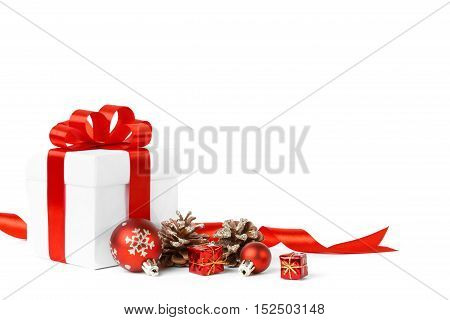 Colorful red gifts with Christmas ornamental isolated on white