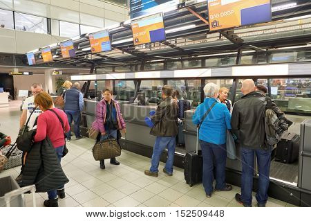 AMSTERDAM, NETHERLANDS - CIRCA NOVEMBER, 2015: check-in counters at Schiphol Airport. Amsterdam Airport Schiphol is the main international airport of the Netherlands.