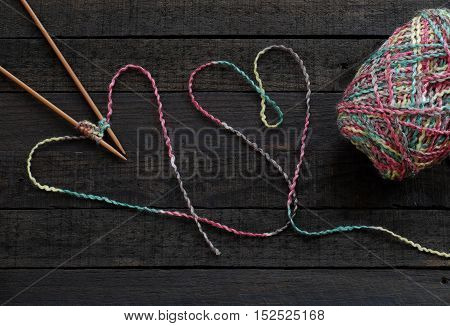 Knitted Background, Knitting Needle And Yarn