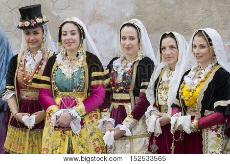CAGLIARI, ITALY - May 1, 2014: 358th Religious Procession of Sant'Efisio - Sardinia - group of beautiful girls in traditional Sardinian costume