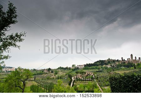 panorama of San Gimignano with its medieval towers which dominate the Tuscan green valleys