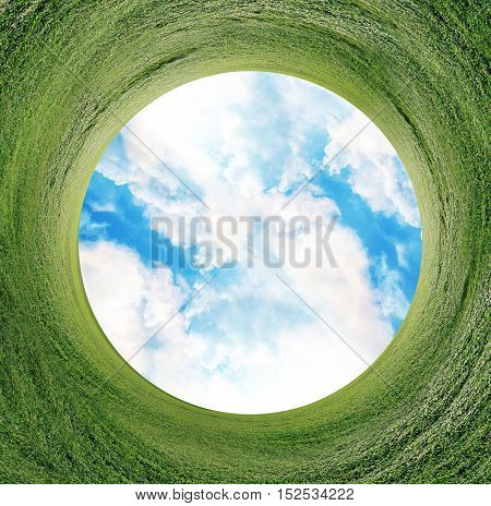Stereographic panoramic projection of a green field and sky