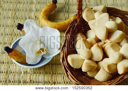 Thai Shortbread Cookies or  Kleeb Lamduan is Thai name.
Thailand dessert and  fragrant or scented candle used for smoking sweetmeats.