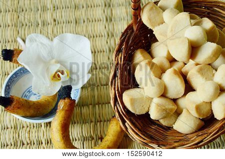 Thai Shortbread Cookies or  Kleeb Lamduan is Thai name.
Thailand dessert and  fragrant or scented candle used for smoking sweetmeats.
