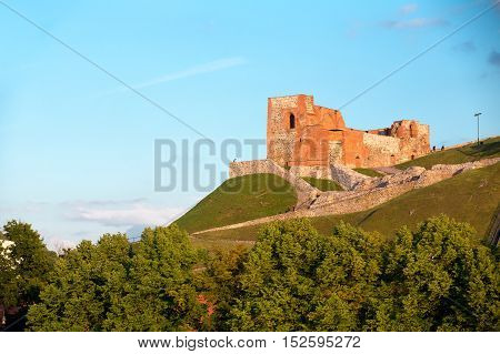 Vilnius, Lithuania. The Remains Of The Ancient Keep Fortress Of Upper Castle On Gediminas Hill, The Part Of The Famous Historical Castle Complex In Sunny Summer Day, Blue Sky Background.