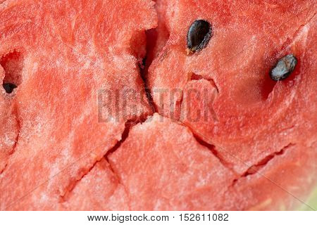 ripe watermelon flesh closeup macro texture background.