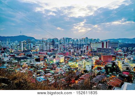 view of central Seoul in the evening taken from Naksan park