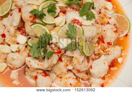 Thai food Herb salad with Fish dreesing with spicy sauce.
