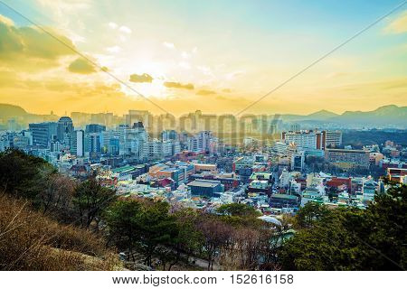 View of Seoul cityscape during sunset from Naksan prk