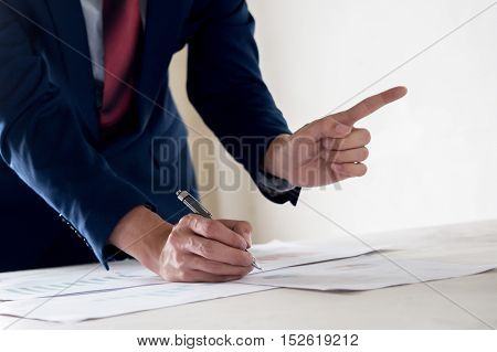 Bossy Business Man Talking And Discussing While Pointing Finger At Other Colleage And Worker On The
