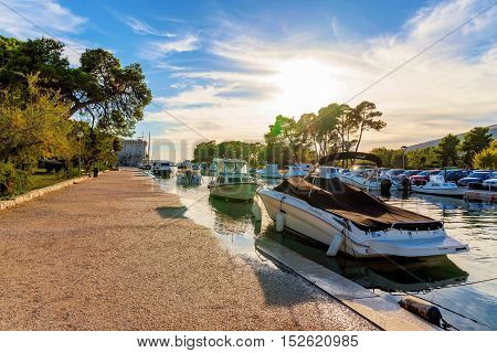 TROGIR CROATIA - SEPTEMBER 18: Docks area in Trogir old town world heritage site with promenade on September 18 2016 in Trogir