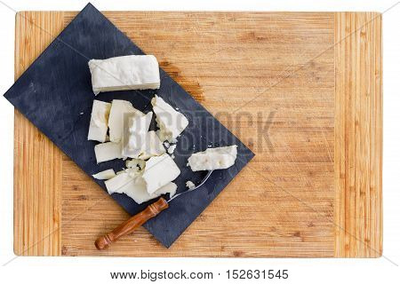 Cut Pieces Of Feta Cheese And Fork
