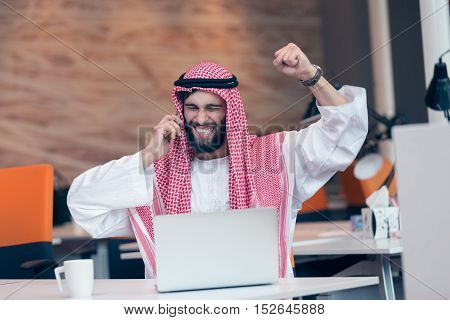 Arabian Businessman Working In Modern Startup Office