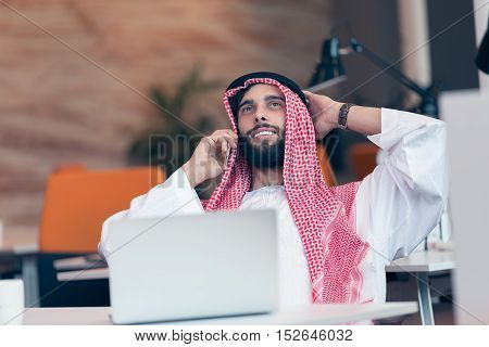 Arabian Businessman Working In Modern Startup Office