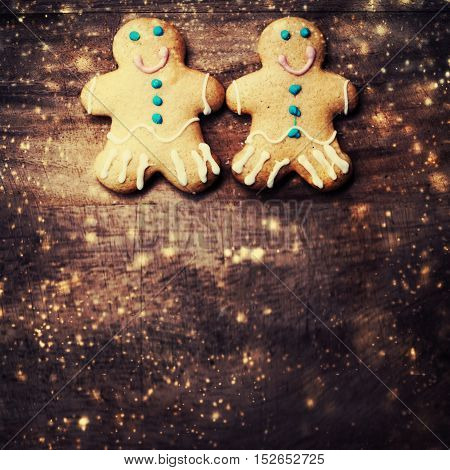 gingerbread man cookie with copyspace and festive glitter