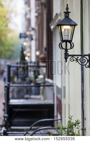 Classical lanterns in the Herengracht street in Amsterdam