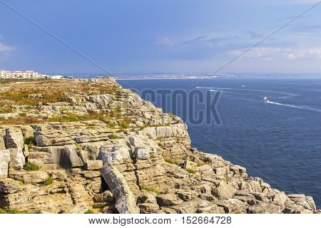 background landscape view of the rocks and the Atlantic Ocean to the Peniche peninsula, near the island of Berlenga, Portugal