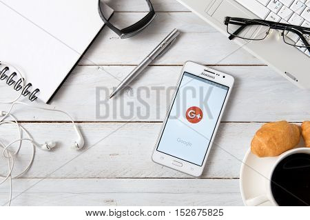 WROCLAW POLAND - OCTOBER 14th 2016: Samsung A5 with Google + application laying on desk. Google+ is an interest-based social network that is owned and operated by Google.