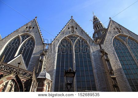 Old church in Amsterdam, Netherlands. The 800 year old Oude Kerk (Old Church) is Amsterdam oldest building and oldest parish church.