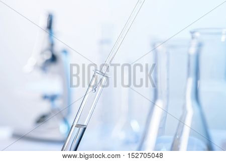 Active substance is added dropwise with a pipette into a test tube