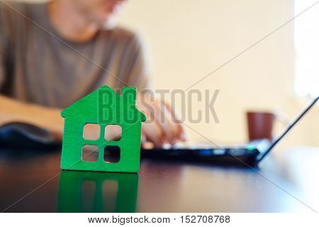 wooden house on the office table