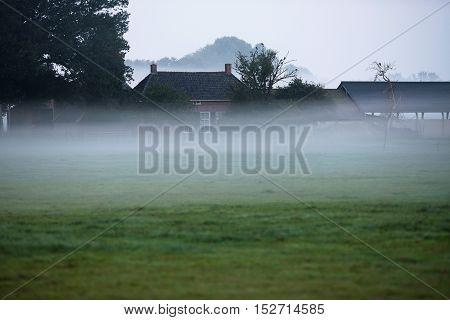 Old Dutch Farm In Morning Mist. Geesteren. Gelderland. The Netherlands.
